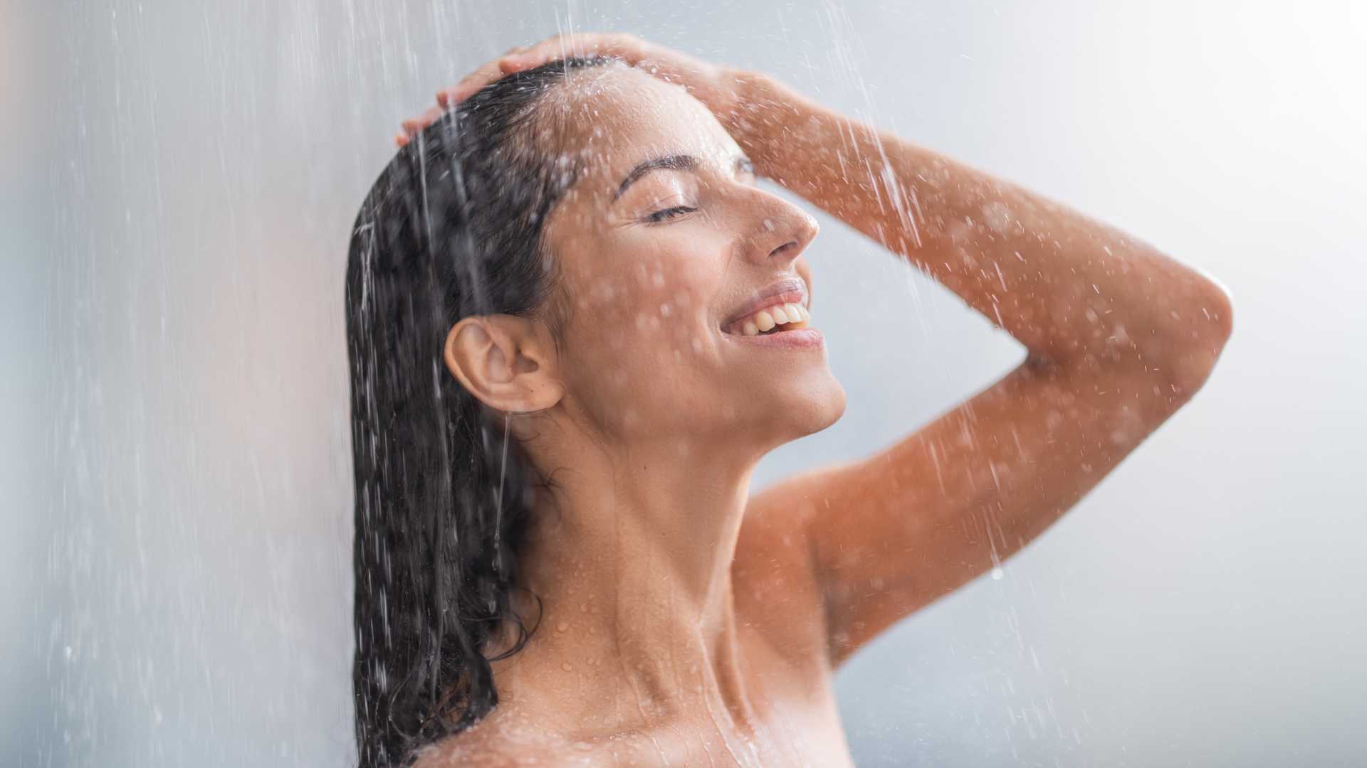woman taking a cold shower