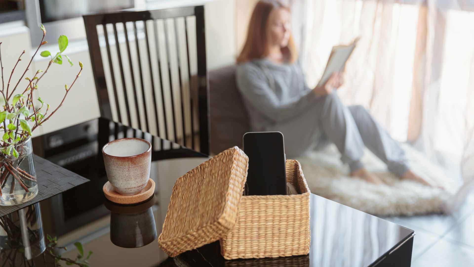 woman reading without her phone